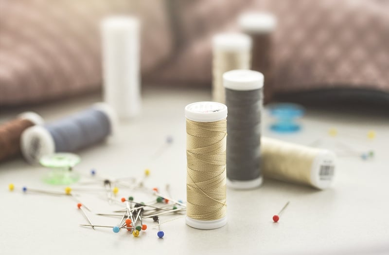 Sewing buttons and needle